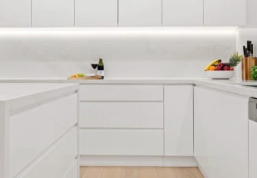 Light and airy modern kitchen featuring HW12342 Maison.